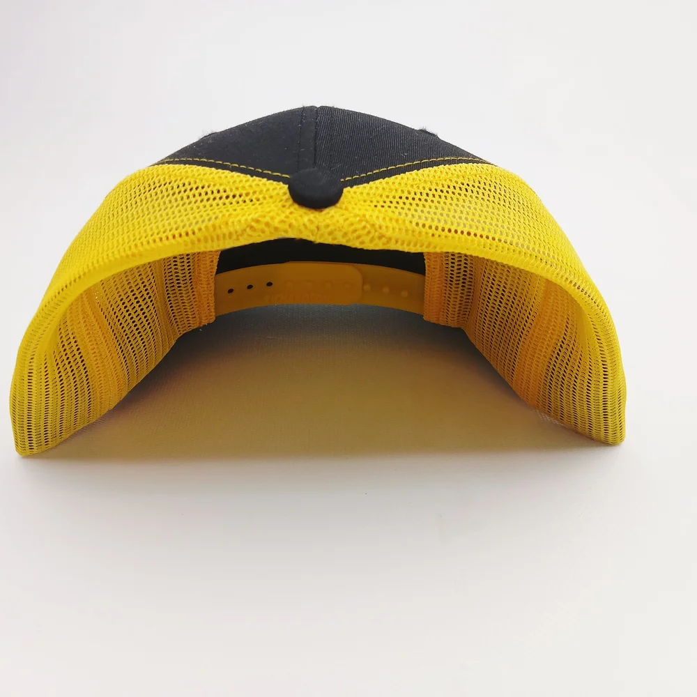 CAT Black and Yellow Richardso 112 Snap Back Trucker Hat
